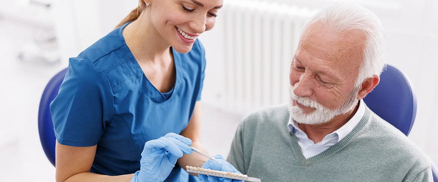 dentist-showing-veneers-to-person-with-diabetes